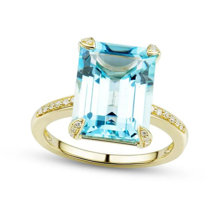 EmeraldCut Faceted Sky Blue Topaz and 010 CT TW Natural Diamond FourCorner Overlay Accent Ring in Solid 10K Yellow Gold Size 7 Goldia Rings EmeraldCut Faceted Sky Blue Topaz and 010 CT TW Natural Diamond FourCorner Overlay Accent Ring in Solid 10K Yellow Gold Size 7 Goldia Rings