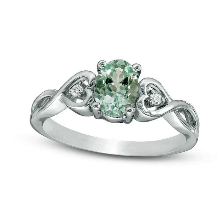 Goldia Rings Oval Aquamarine and Natural Diamond Accent Heart Sides Promise Ring in Sterling Silver Goldia Rings Oval Aquamarine and Natural Diamond Accent Heart Sides Promise Ring in Sterling Silver