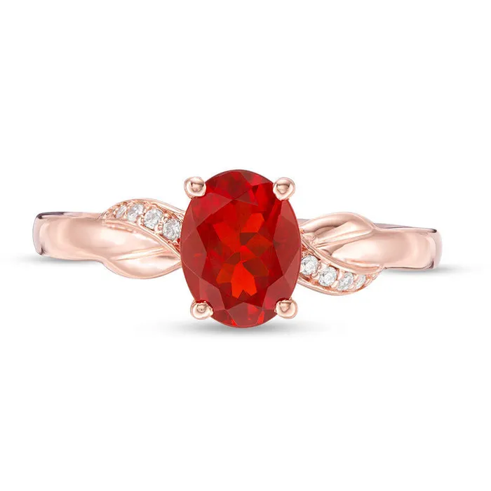 Goldia Rings Oval Fire Opal and Natural Diamond Accent Infinity Knot Ring in Solid 10K Rose Gold Goldia Rings Oval Fire Opal and Natural Diamond Accent Infinity Knot Ring in Solid 10K Rose Gold