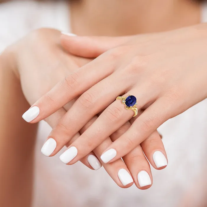 Solid 14k Yellow Gold 9x7mm Oval Simulated Sapphire A CZ Ring Goldia Rings